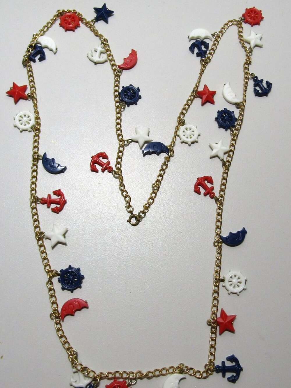 costume fun necklace with red, white and blue plastic nautical charms 34 inches